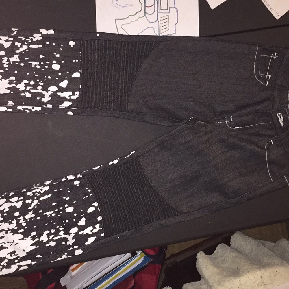 Diamond$tash Dark jeans with white splatter.